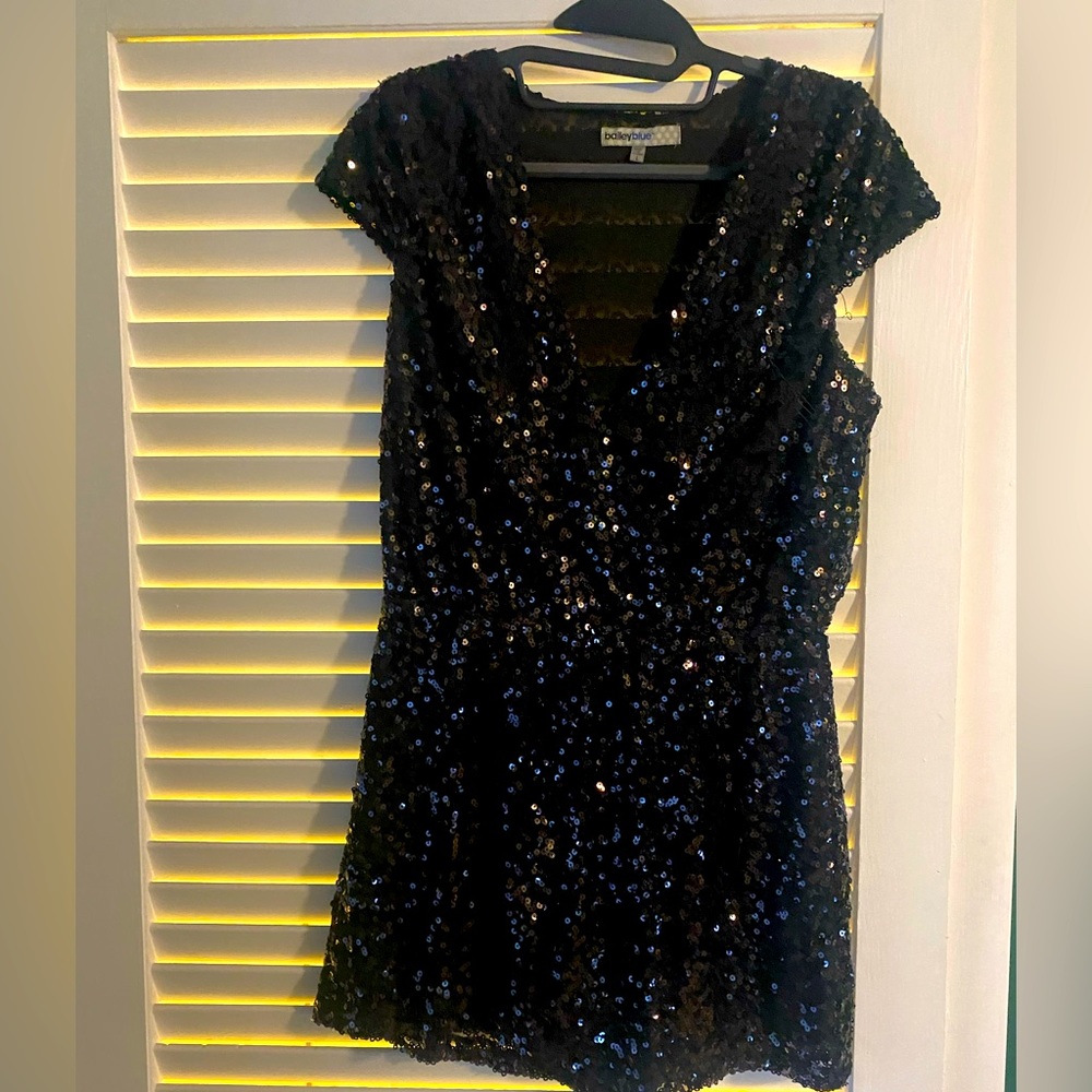 Black sequined romper in size L.